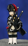 Quilling by Barbara Machado, Bagpipe Player 2004